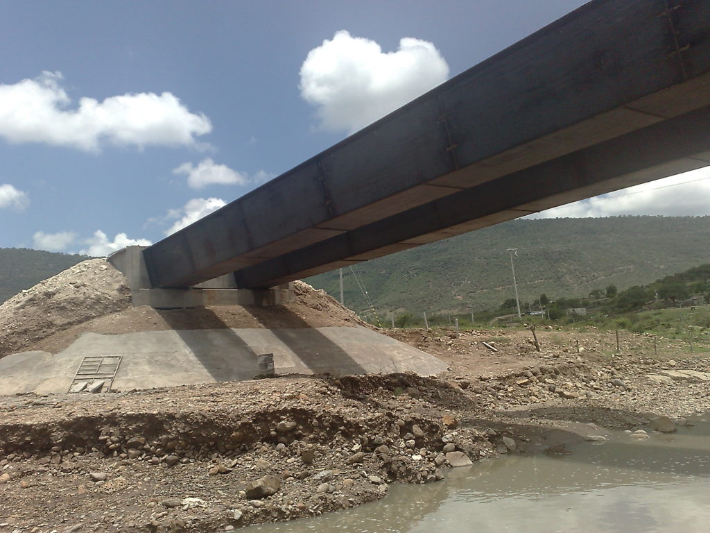 ConstrucciConstrucción de Puente Vehicular, en el Poblado de Tenzompa​ón de Puente Vehicular, en el Poblado de Tenzompa​